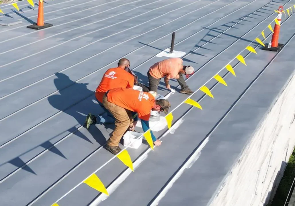 commercial roofing image of workers